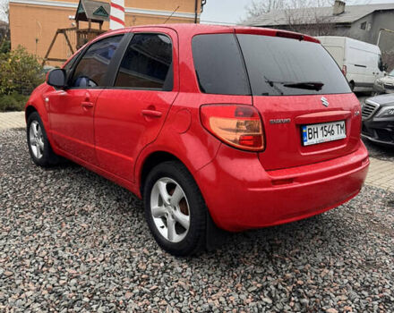 Красный Сузуки СХ4, объемом двигателя 1.59 л и пробегом 183 тыс. км за 6700 $, фото 3 на Automoto.ua