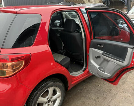 Красный Сузуки СХ4, объемом двигателя 1.59 л и пробегом 200 тыс. км за 5500 $, фото 6 на Automoto.ua