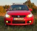 Червоний Сузукі СХ4, об'ємом двигуна 1.6 л та пробігом 215 тис. км за 6500 $, фото 1 на Automoto.ua