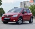 Красный Сузуки СХ4, объемом двигателя 2 л и пробегом 175 тыс. км за 6200 $, фото 1 на Automoto.ua