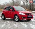 Червоний Сузукі СХ4, об'ємом двигуна 1.6 л та пробігом 204 тис. км за 6500 $, фото 1 на Automoto.ua