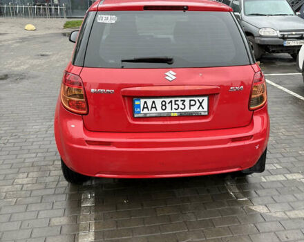 Красный Сузуки СХ4, объемом двигателя 1.59 л и пробегом 200 тыс. км за 5500 $, фото 3 на Automoto.ua