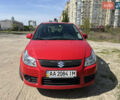 Красный Сузуки СХ4, объемом двигателя 1.6 л и пробегом 302 тыс. км за 6150 $, фото 1 на Automoto.ua