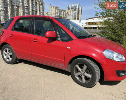 Красный Сузуки СХ4, объемом двигателя 1.6 л и пробегом 302 тыс. км за 6150 $, фото 2 на Automoto.ua