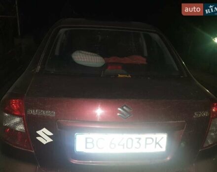 Красный Сузуки СХ4, объемом двигателя 1.6 л и пробегом 195 тыс. км за 4300 $, фото 7 на Automoto.ua