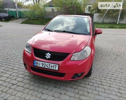 Красный Сузуки СХ4, объемом двигателя 1.6 л и пробегом 405 тыс. км за 3600 $, фото 4 на Automoto.ua