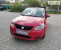 Красный Сузуки СХ4, объемом двигателя 1.6 л и пробегом 405 тыс. км за 3600 $, фото 4 на Automoto.ua