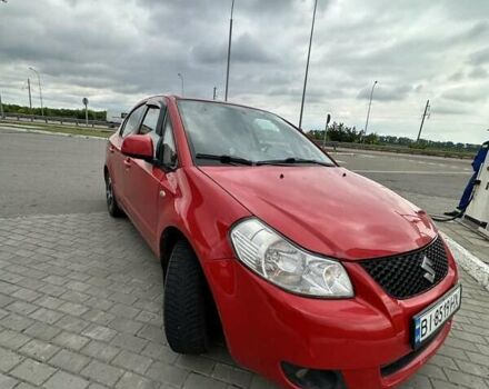 Красный Сузуки СХ4, объемом двигателя 1.6 л и пробегом 405 тыс. км за 3600 $, фото 1 на Automoto.ua