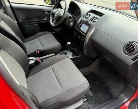 Червоний Сузукі СХ4, об'ємом двигуна 1.6 л та пробігом 181 тис. км за 6200 $, фото 13 на Automoto.ua