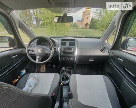 Красный Сузуки СХ4, объемом двигателя 1.6 л и пробегом 405 тыс. км за 3600 $, фото 10 на Automoto.ua