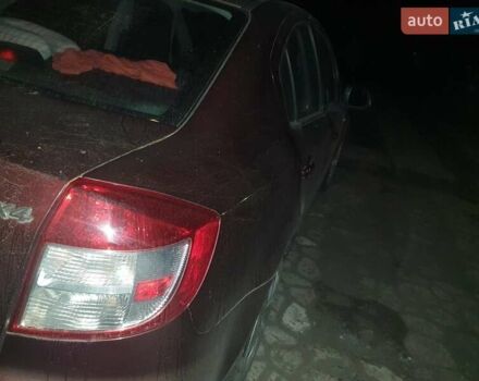 Красный Сузуки СХ4, объемом двигателя 1.6 л и пробегом 195 тыс. км за 4300 $, фото 4 на Automoto.ua