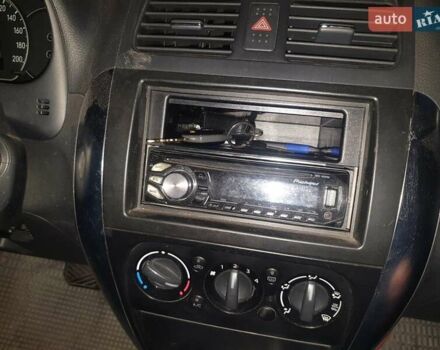 Красный Сузуки СХ4, объемом двигателя 1.6 л и пробегом 195 тыс. км за 4300 $, фото 15 на Automoto.ua