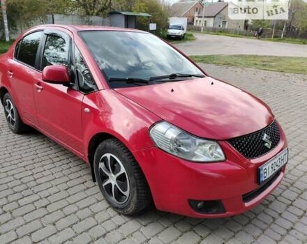 Красный Сузуки СХ4, объемом двигателя 1.6 л и пробегом 405 тыс. км за 3600 $, фото 2 на Automoto.ua