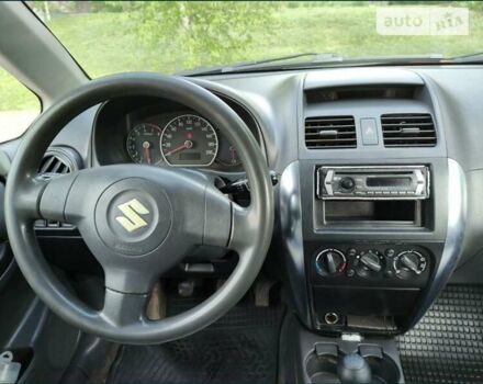Красный Сузуки СХ4, объемом двигателя 1.6 л и пробегом 405 тыс. км за 3600 $, фото 9 на Automoto.ua