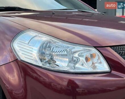 Сузуки СХ4 2010 в Львове на Automoto.ua Красный Сузуки СХ4, объемом двигателя 2 л и пробегом 231 тыс. км за 5190 $, фото 11 на Automoto.ua