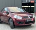 Сузуки СХ4 2010 в Львове на Automoto.ua Красный Сузуки СХ4, объемом двигателя 2 л и пробегом 231 тыс. км за 5190 $, фото 9 на Automoto.ua