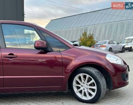 Сузуки СХ4 2010 в Львове на Automoto.ua Красный Сузуки СХ4, объемом двигателя 2 л и пробегом 231 тыс. км за 5190 $, фото 8 на Automoto.ua
