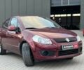 Сузуки СХ4 2010 в Львове на Automoto.ua Красный Сузуки СХ4, объемом двигателя 2 л и пробегом 231 тыс. км за 5190 $, фото 5 на Automoto.ua