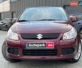 Сузуки СХ4 2010 в Львове на Automoto.ua Красный Сузуки СХ4, объемом двигателя 2 л и пробегом 231 тыс. км за 5190 $, фото 10 на Automoto.ua