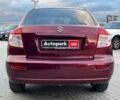 Сузуки СХ4 2010 в Львове на Automoto.ua Красный Сузуки СХ4, объемом двигателя 2 л и пробегом 231 тыс. км за 5190 $, фото 2 на Automoto.ua