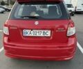 Красный Сузуки СХ4, объемом двигателя 2 л и пробегом 170 тыс. км за 8900 $, фото 1 на Automoto.ua