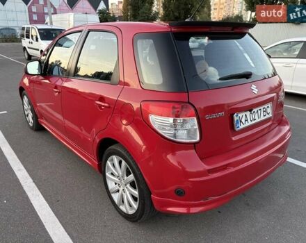 Красный Сузуки СХ4, объемом двигателя 2 л и пробегом 170 тыс. км за 8900 $, фото 5 на Automoto.ua