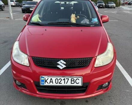 Красный Сузуки СХ4, объемом двигателя 2 л и пробегом 170 тыс. км за 8900 $, фото 2 на Automoto.ua