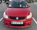 Красный Сузуки СХ4, объемом двигателя 2 л и пробегом 170 тыс. км за 8900 $, фото 2 на Automoto.ua