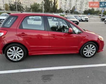 Красный Сузуки СХ4, объемом двигателя 2 л и пробегом 170 тыс. км за 8900 $, фото 4 на Automoto.ua
