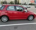 Красный Сузуки СХ4, объемом двигателя 2 л и пробегом 170 тыс. км за 8900 $, фото 4 на Automoto.ua