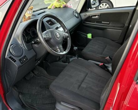 Красный Сузуки СХ4, объемом двигателя 2 л и пробегом 170 тыс. км за 8900 $, фото 7 на Automoto.ua