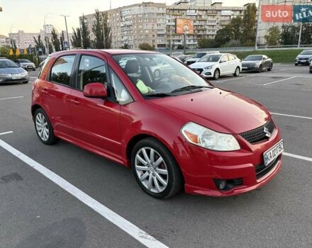 Красный Сузуки СХ4, объемом двигателя 2 л и пробегом 170 тыс. км за 8900 $, фото 3 на Automoto.ua