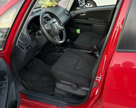 Красный Сузуки СХ4, объемом двигателя 2 л и пробегом 170 тыс. км за 8900 $, фото 8 на Automoto.ua