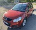 Красный Сузуки СХ4, объемом двигателя 1.6 л и пробегом 202 тыс. км за 6699 $, фото 1 на Automoto.ua