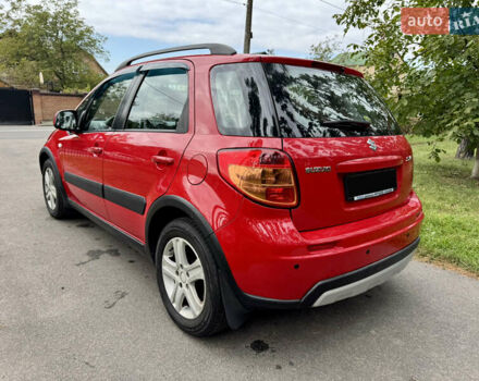 Червоний Сузукі СХ4, об'ємом двигуна 1.6 л та пробігом 166 тис. км за 9000 $, фото 4 на Automoto.ua