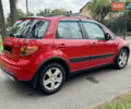 Червоний Сузукі СХ4, об'ємом двигуна 1.6 л та пробігом 166 тис. км за 9000 $, фото 12 на Automoto.ua