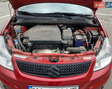 Красный Сузуки СХ4, объемом двигателя 2 л и пробегом 315 тыс. км за 8500 $, фото 8 на Automoto.ua