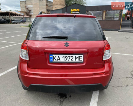 Красный Сузуки СХ4, объемом двигателя 2 л и пробегом 315 тыс. км за 8500 $, фото 4 на Automoto.ua
