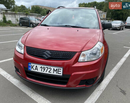 Красный Сузуки СХ4, объемом двигателя 2 л и пробегом 315 тыс. км за 8500 $, фото 2 на Automoto.ua