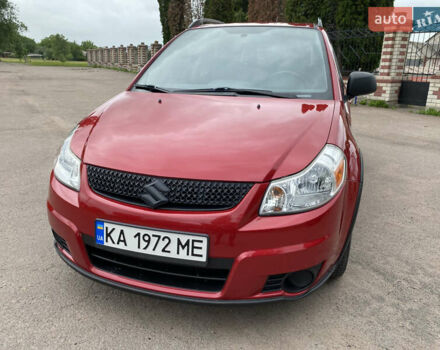 Красный Сузуки СХ4, объемом двигателя 2 л и пробегом 315 тыс. км за 8000 $, фото 7 на Automoto.ua