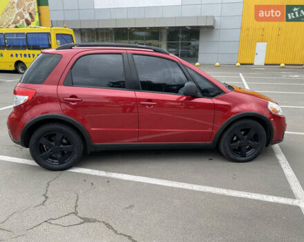 Красный Сузуки СХ4, объемом двигателя 2 л и пробегом 315 тыс. км за 8500 $, фото 6 на Automoto.ua