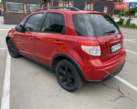 Красный Сузуки СХ4, объемом двигателя 2 л и пробегом 315 тыс. км за 8500 $, фото 3 на Automoto.ua