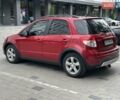 Красный Сузуки СХ4, объемом двигателя 2 л и пробегом 200 тыс. км за 9500 $, фото 11 на Automoto.ua