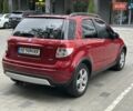 Красный Сузуки СХ4, объемом двигателя 2 л и пробегом 200 тыс. км за 9500 $, фото 3 на Automoto.ua
