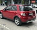 Красный Сузуки СХ4, объемом двигателя 2 л и пробегом 200 тыс. км за 9500 $, фото 5 на Automoto.ua