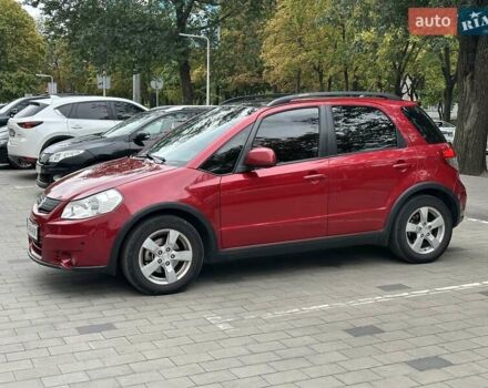 Красный Сузуки СХ4, объемом двигателя 2 л и пробегом 200 тыс. км за 9500 $, фото 9 на Automoto.ua