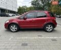 Красный Сузуки СХ4, объемом двигателя 2 л и пробегом 200 тыс. км за 9500 $, фото 10 на Automoto.ua