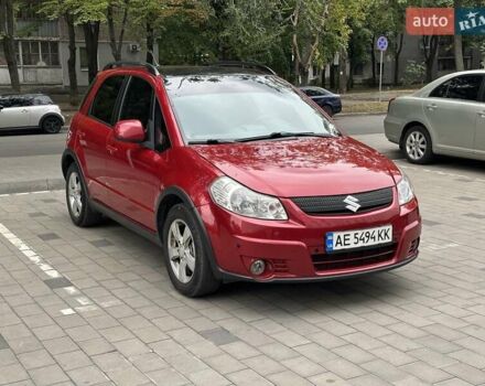 Красный Сузуки СХ4, объемом двигателя 2 л и пробегом 200 тыс. км за 9500 $, фото 2 на Automoto.ua