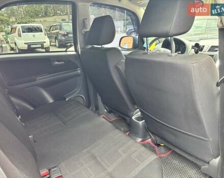 Червоний Сузукі СХ4, об'ємом двигуна 2 л та пробігом 300 тис. км за 10000 $, фото 7 на Automoto.ua