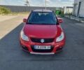 Красный Сузуки СХ4, объемом двигателя 1.6 л и пробегом 128 тыс. км за 10650 $, фото 1 на Automoto.ua